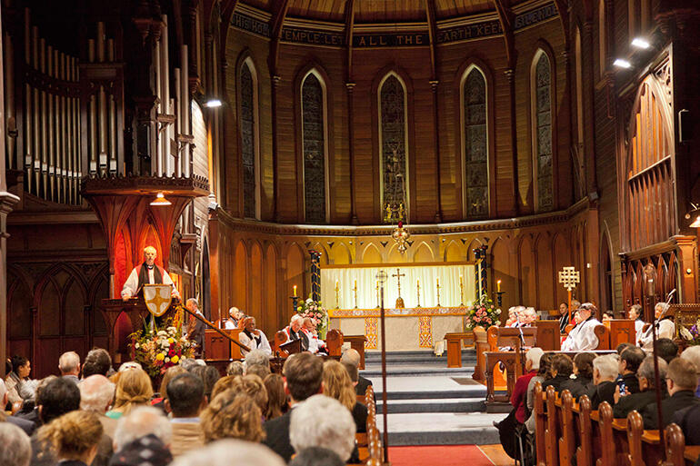 Archbishop Welby preaches to a full house in the elegant 135-year old wooden church.
