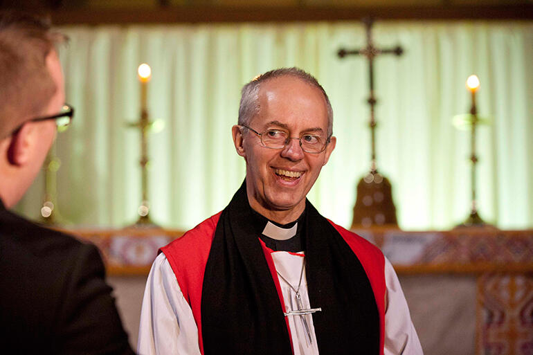 Archbishop Welby responds to a journalist after the service.