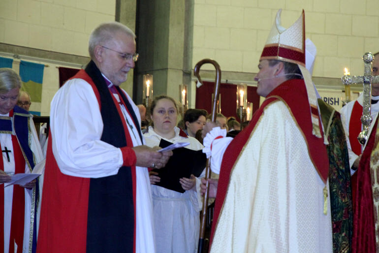 Bishop Kelvin presents the pastoral staff: "Be a true shepherd of the people of God in the name of Christ, the Good Shepherd." Bishop Kelvin presents the pastoral staff: "Be a true shepherd of the people of God in the name of Christ, the Good Shepherd."
