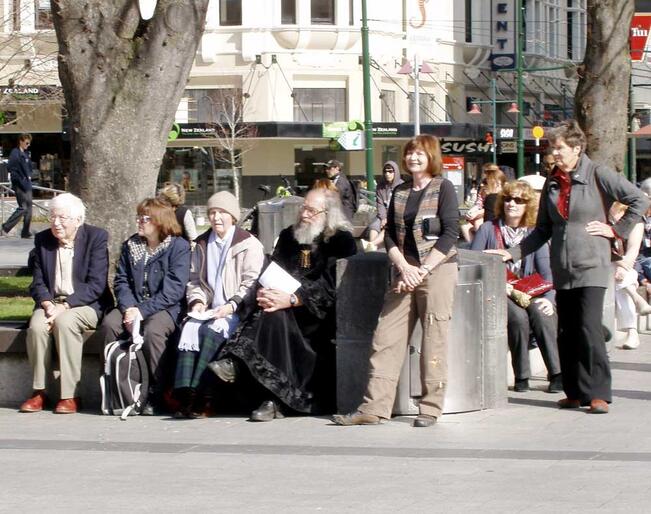 The Wizard of Christchurch joins the 500-strong crowd for Sunday morning's open-air service in Cathedral Square.