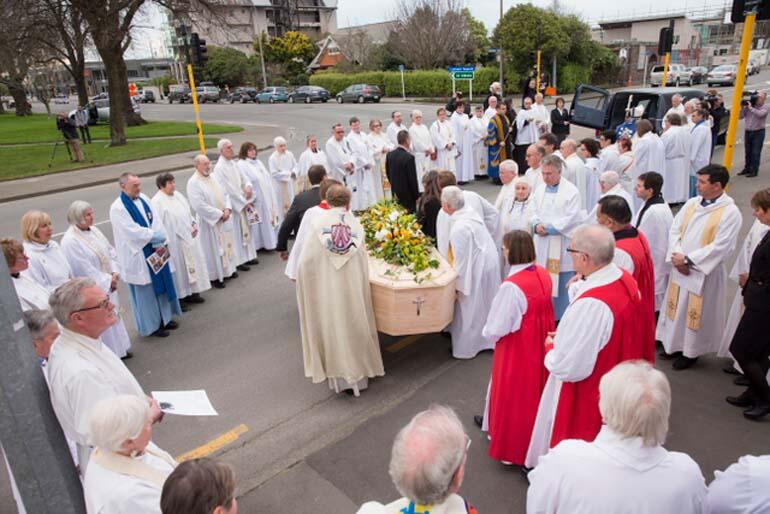 Clergy form a guard of honour. Clergy form a guard of honour.