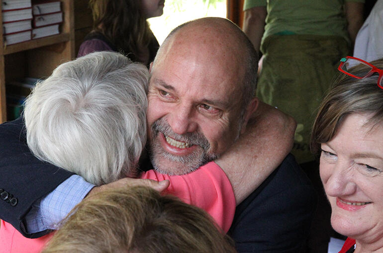 Hugh Kemp rejoices with Lesley Ayers. Lesley was one of the large crew who came from All Saints Palmerston North. Hugh Kemp rejoices with Lesley Ayers. Lesley was one of the large crew who came from All Saints Palmerston North.