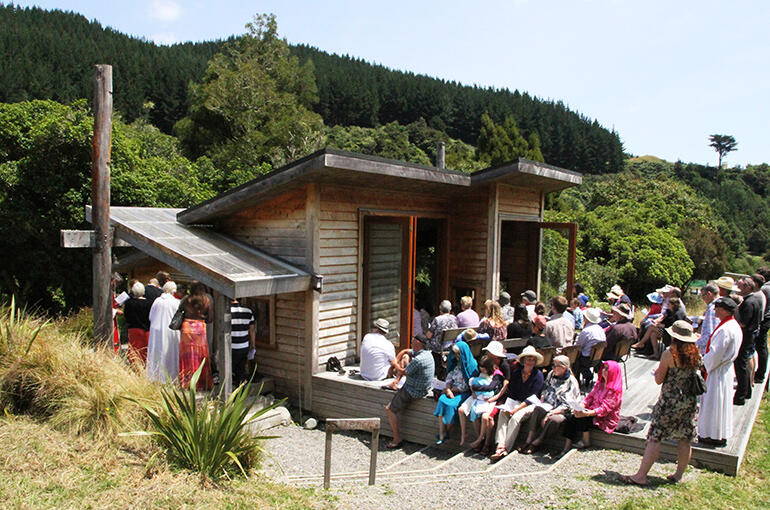 The overflow crowd of wellwishers - perhaps 130 turned up - wait for the service to begin. The overflow crowd of wellwishers - perhaps 130 turned up - wait for the service to begin.