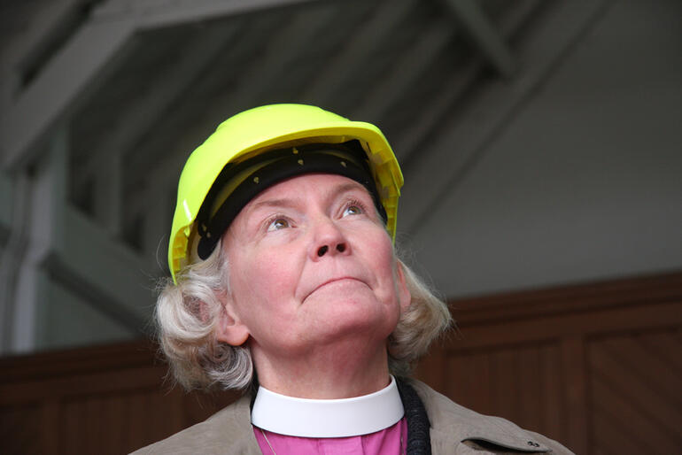 Bishop Victoria surveys the damage to the structure of the chapel. Bishop Victoria surveys the damage to the structure of the chapel.