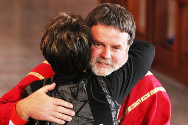 Archdeacon Anne Mills from the Diocese of Waikato and Taranaki congratulates Archbishop-elect Philip Richardson.
