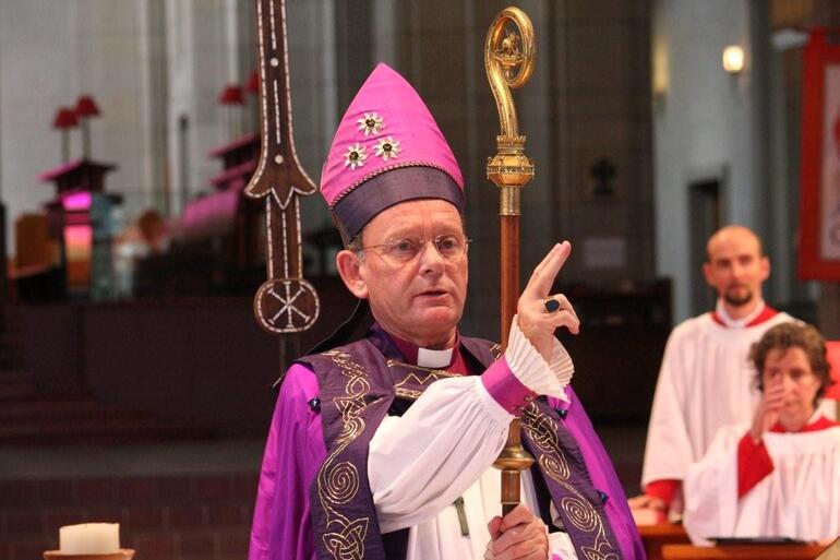 Bishop John gives his blessing.