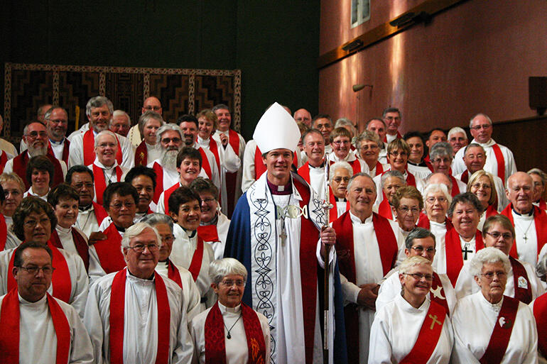 June 7, 2008 - and the newly-ordained Bishop of Waiapu stands with his clergy in Napier's Waiapu cathedral.