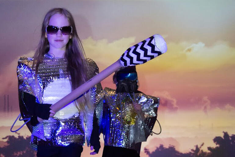 Caroline Walmsley (10) and Edie Apperley (9) - who are both from the cathedral - modelling: 'Air Pollution Robots'.