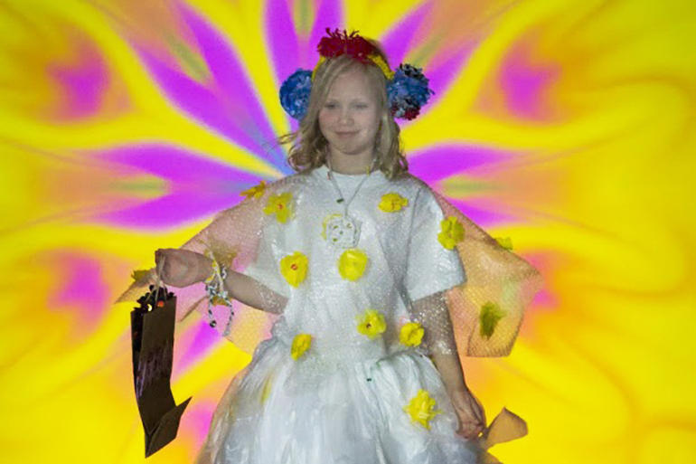 Evangeline Leach (9) who is from Samuel Marsden Collegiate, modelling: 'Spring'.