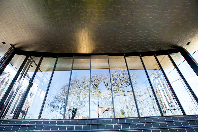 As seen from the outside, with the cross reflected in the doors - the 'east' end of the new chapel.