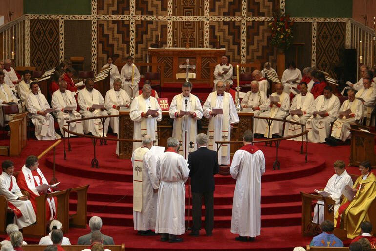 David Rice is presented to the archbishops. David Rice is presented to the archbishops.