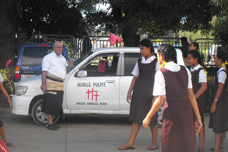 Bishop-elect 'Afa Vaka and his mobile pulpit. Often, he preaches in settings more turbulent than this one. Bishop-elect 'Afa Vaka and his mobile pulpit. Often, he preaches in settings more turbulent than this one.