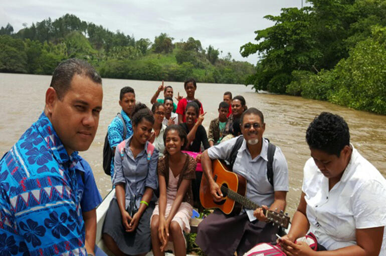 Bishop-elect Henry Bull (with the guitar) doing what he loves best - going on mission - in the territory he loves best. Bishop-elect Henry Bull (with the guitar) doing what he loves best - going on mission - in the territory he loves best.