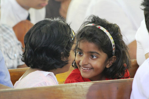 Anita Abraham discusses an exegetical point with her cousin Sharon.