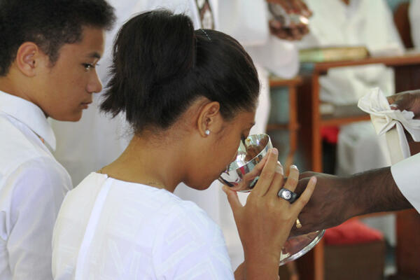 Josephine Yandall makes her Easter morning Eucharist.