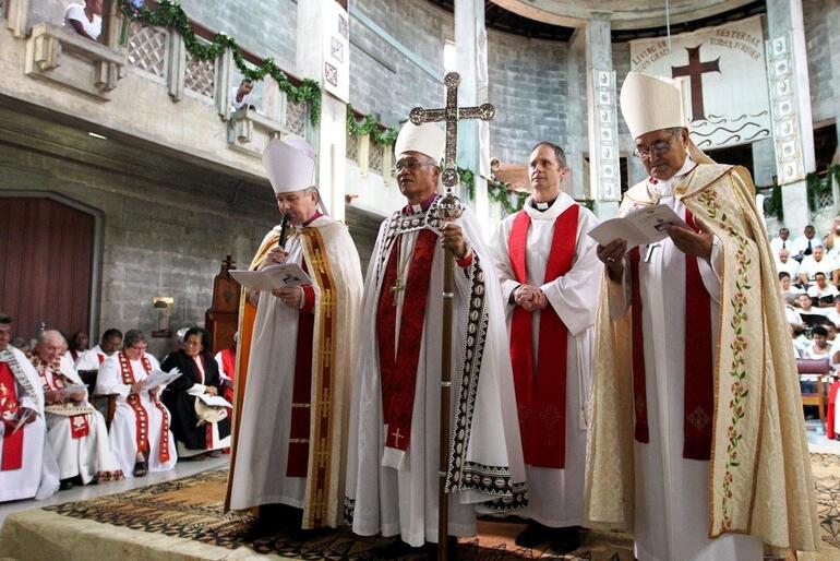 Archbishop Winston, flanked by Archbishops David (left) and Brown at his installation as Bishop of Polynesia in August 2010. Archbishop Winston, flanked by Archbishops David (left) and Brown at his installation as Bishop of Polynesia in August 2010.