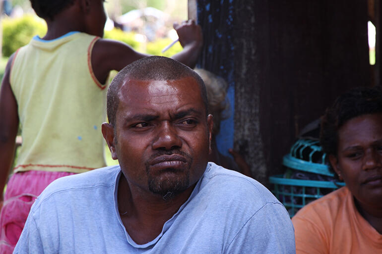 Jesa Baso, who is the chief's son. He tried to lead his family to shelter during the cyclone, but he couldn't even crawl through the blast.