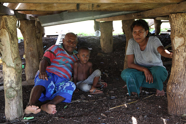 Mosese Kakaramu lies among the pilings of his house, where eight members of his family sought shelter from the storm. Mosese Kakaramu lies among the pilings of his house, where eight members of his family sought shelter from the storm.