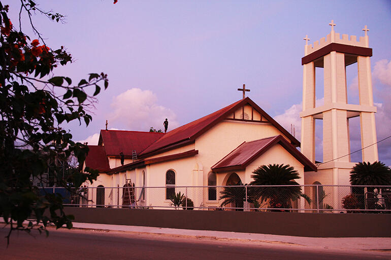 ... and after: Workmen laboured late into the last evening (see the rooftop figures) before the church was rededicated.