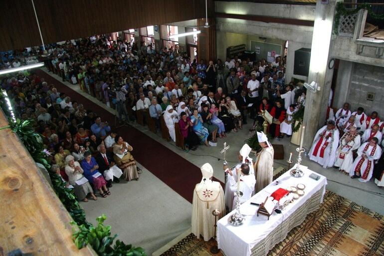 Archbishops Brown and David present the new Bishop of Polynesia to his people. Archbishops Brown and David present the new Bishop of Polynesia to his people.