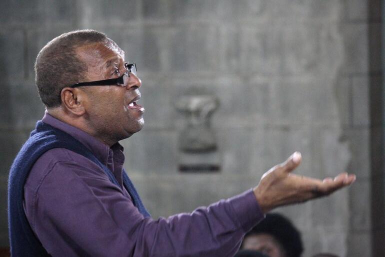 Fr Tomu Asioli puts his massed choir through their paces at Saturday evening's dress rehearsal.