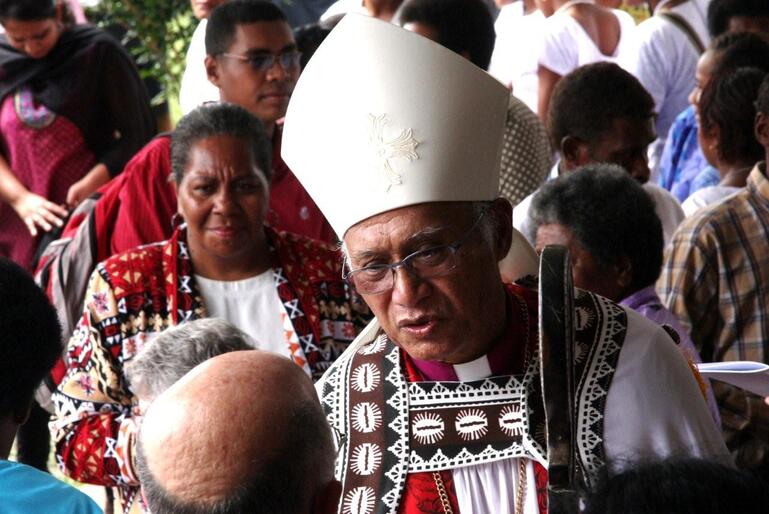 Hundreds stood in line after the service to greet their new bishop. 