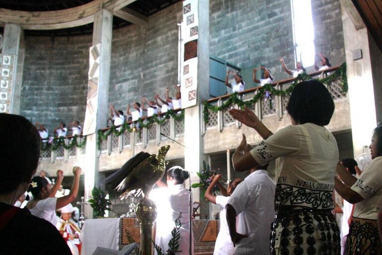 The young people - including, in the foreground, members of the Tongan congregation in Auckland - proclaim the power of his love.