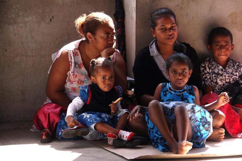 These folk checked the service out from the verandah.