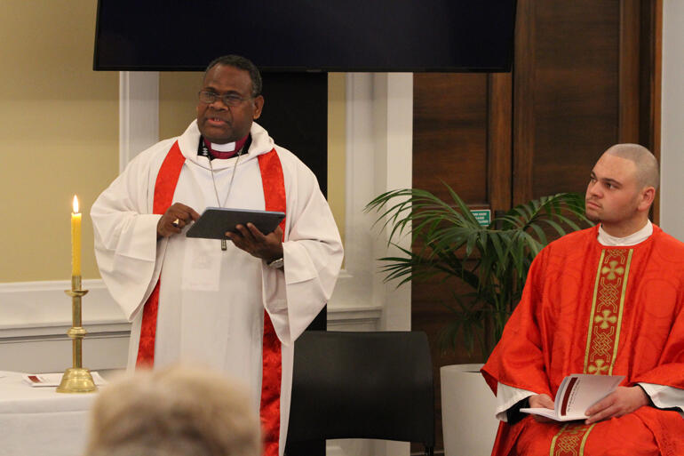 Archbishop Leonard Dawea preaches on the martyrs of Melanesia as Rev Zhane Tahau Whelan looks on. Archbishop Leonard Dawea preaches on the martyrs of Melanesia as Rev Zhane Tahau Whelan looks on.