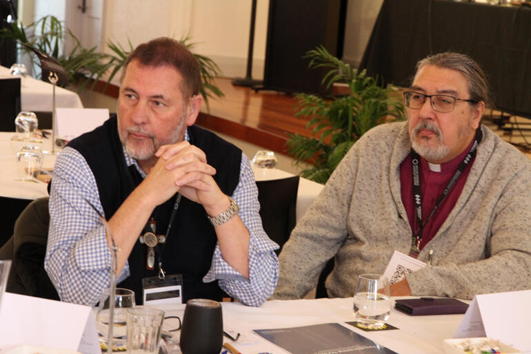 Australia's National Indigenous Bishop Chris McLeod and Archbishop Chris Harper listen to governance kōrero. Australia's National Indigenous Bishop Chris McLeod and Archbishop Chris Harper listen to governance kōrero.