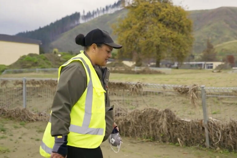 Amelia Kaui walks across the silt strewn fields at Hukarere, just as she had walked to check the Esk River on 13 February 2023. Amelia Kaui walks across the silt strewn fields at Hukarere, just as she had walked to check the Esk River on 13 February 2023.