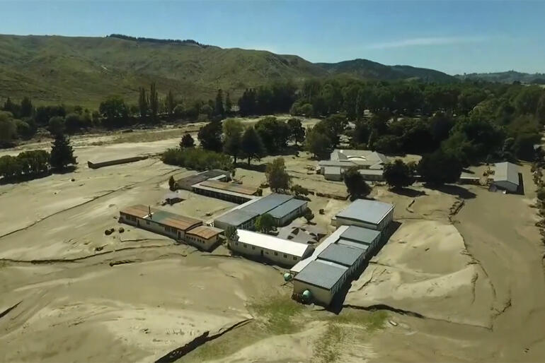 An aerial view of Hukarere taken in May shows tons of piled up silt covering the former gardens, paths, roads and green fields. An aerial view of Hukarere taken in May shows tons of piled up silt covering the former gardens, paths, roads and green fields.