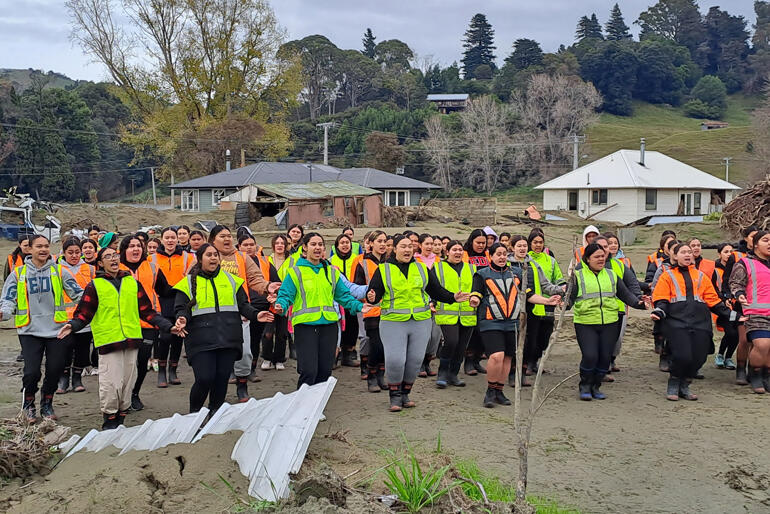 Hukarere Girls' College students perform kapa haka at the devastated site of their former school and home. Hukarere Girls' College students perform kapa haka at the devastated site of their former school and home.
