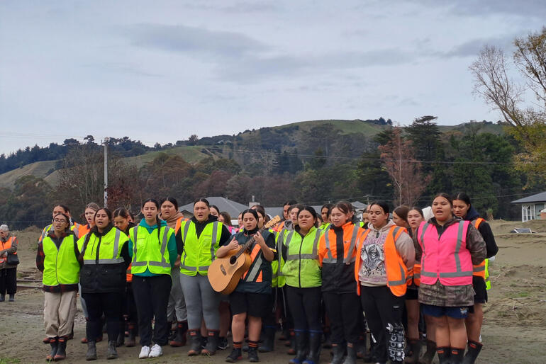 Hukarere girls sing a waiata in the grounds of their flood-ravaged former school and home in Esk Valley. Hukarere girls sing a waiata in the grounds of their flood-ravaged former school and home in Esk Valley.