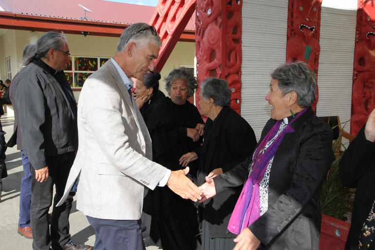 Simon Heath greets Rev Numia Tomoana on the hongi line as Te Runanganui arrives. Simon Heath greets Rev Numia Tomoana on the hongi line as Te Runanganui arrives.