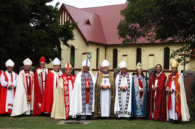 The bishops gathered after the service outside Toko Toru Tapu church - which is 50 metres from the marae.