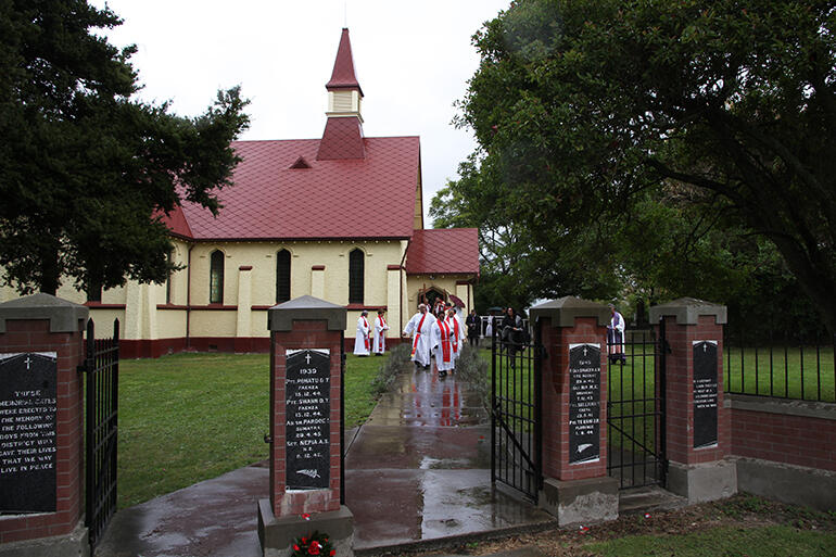 Toko Toru Tapu church, as seen from its war memorial gates, is one of four fully-carved churches in Aotearoa.