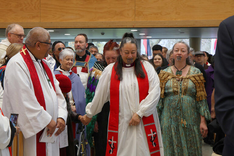 Bishop-elect Susan enters the Transitional Cathedral as a kaikaranga calls her in.