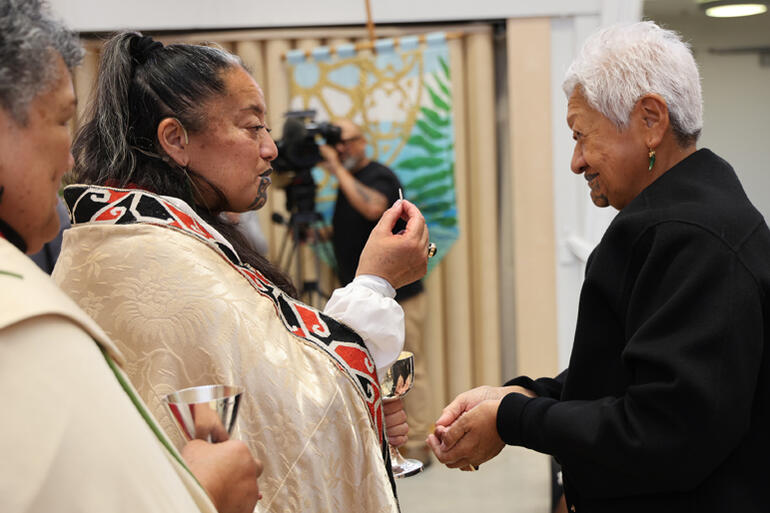 Bishop Susan Wallace serves Te Makau Ariki Atawhai accompanied by Archdeacon Hannah Pomare.