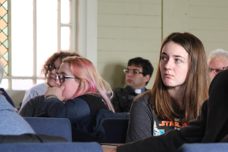 Sophie Cawood (right), one of the young adults who chaired each session, listens to Rev Anne van Gend.