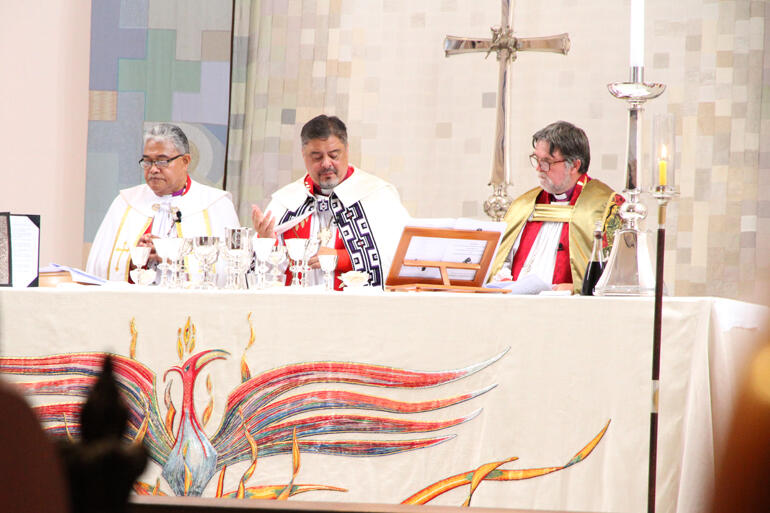 Archbishops Sione, Don and Philip preside at the Eucharist.