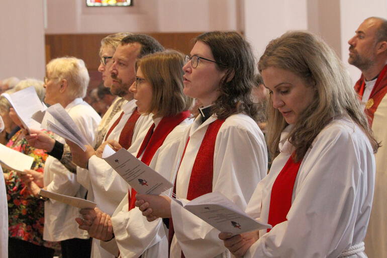 Clergy from the Diocese of Wellington join in the gradual hymn, "Take my life and let it be."