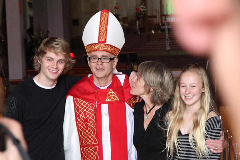 Bishop Jim on his episcopal ordination day in 2011, flanked by his wife Jane Hart, son Samuel and daughter Sophie. Photo: Lloyd Ashton