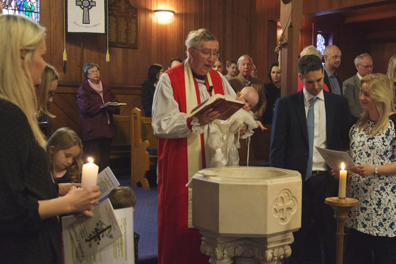 Continuing to serve long into retirement, here Bishop Peter Atkins baptises a new member of Christ's family at St Aidan's. Continuing to serve long into retirement, here Bishop Peter Atkins baptises a new member of Christ's family at St Aidan's.