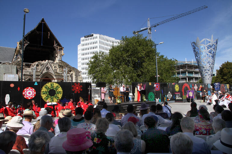 Bishop Peter addresses city and diocese in front of his ruined Christ Church Cathedral.