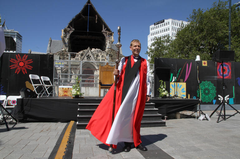 Bishop Peter Carrell faces the city and diocese in Cathedral Square following his installation in front of the ruined cathedral. Bishop Peter Carrell faces the city and diocese in Cathedral Square following his installation in front of the ruined cathedral.