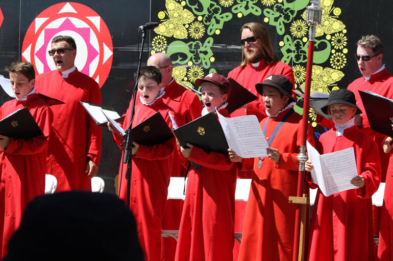 The Christ Church cathedral choir sings during Bishop Peter's installation service. The Christ Church cathedral choir sings during Bishop Peter's installation service.