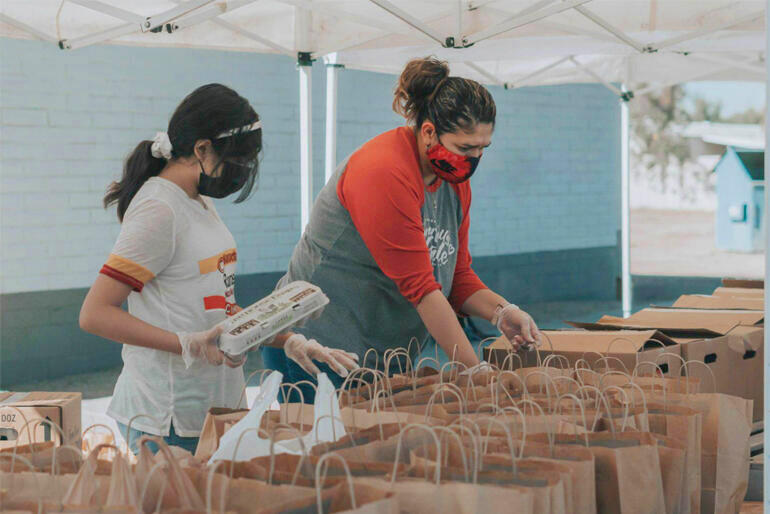 Auckland City Mission volunteers pack food parcels. Photo: https://givealittle.co.nz/fundraiser/nicolas-fundraiser-for-auckland-city-mission Auckland City Mission volunteers pack food parcels. Photo: https://givealittle.co.nz/fundraiser/nicolas-fundraiser-for-auckland-city-mission