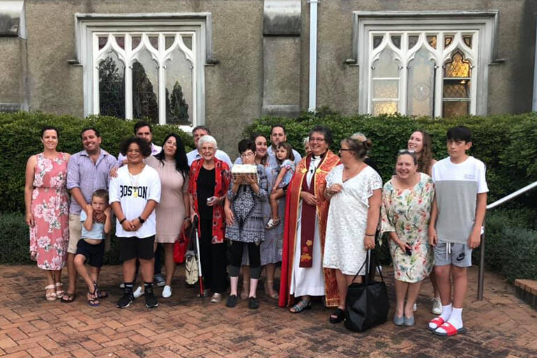 Dean Wendy Scott lines up outside the Waikato Cathedral of St Peter with her whānau supporters.