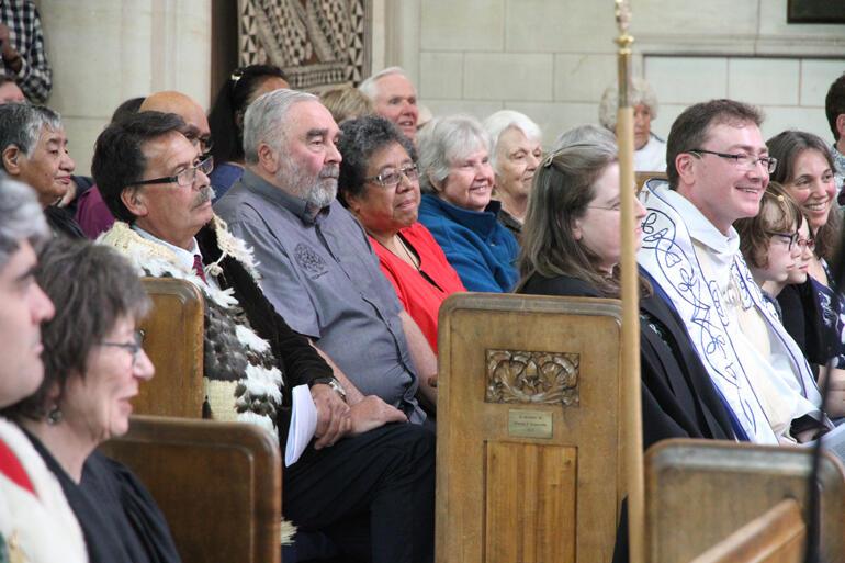 L-R: Prof. John Broughton (Ngai Tahu) and S.Paul's Thursday Hākari Tapu congregation back Dean Tony Curtis and his family at St Paul's Cathedral.